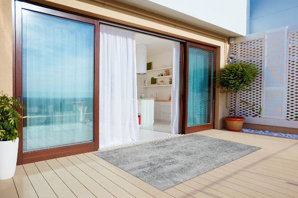 Outdoor rug for terrace dirty concrete